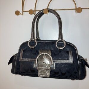 Coach purse 
Black and Silver Snake Satchel